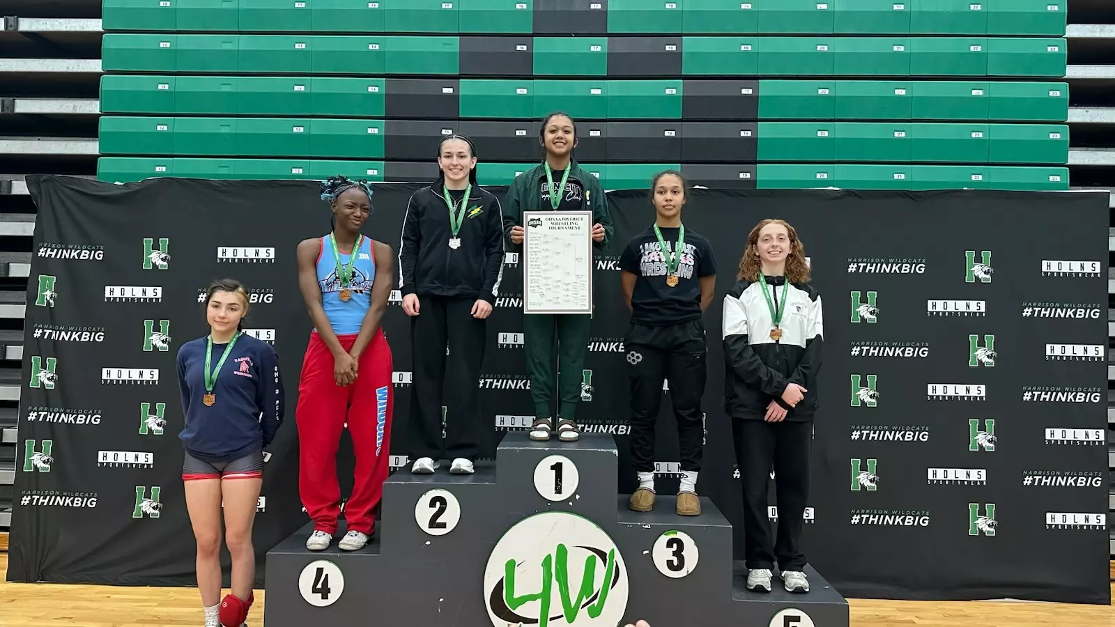 Little Miami wrestler on the district podium